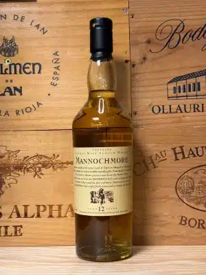 Mannochmore 12 Year Old Flora & Fauna – Speyside single malt whisky in 700ml fles met floraal etiket en heldere amberkleur.