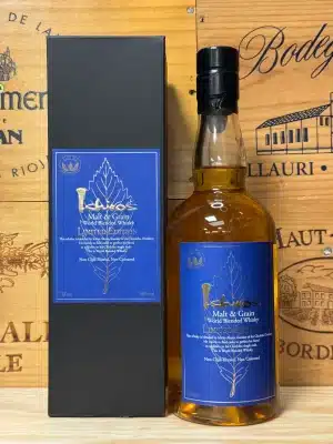 Fles Ichiro's Malt & Grain Limited Edition whisky met stijlvol etiket in wit en goud, gepresenteerd naast de bijpassende doos