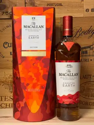 Fles The Macallan A Night on Earth – In Scotland in kleurrijke verpakking, een single malt whisky geïnspireerd op het Schotse Hogmanay-feest.