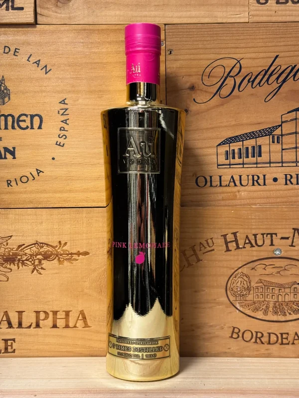 Gouden metallic fles Au Vodka Pink Lemonade met frisse smaak van citroen en rode vruchten, luxe uitstraling en zomers karakter.