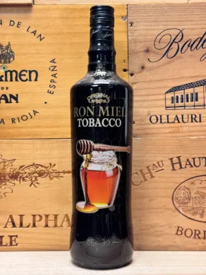 Fles Tobacco Ron Miel zachte honingrum met warme rumtonen.
